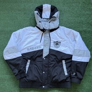 NFL LAS VEGAS RAIDERS PRO PLAYER SPELL OUT WINDBREAKER JACKET SIZE 2XL